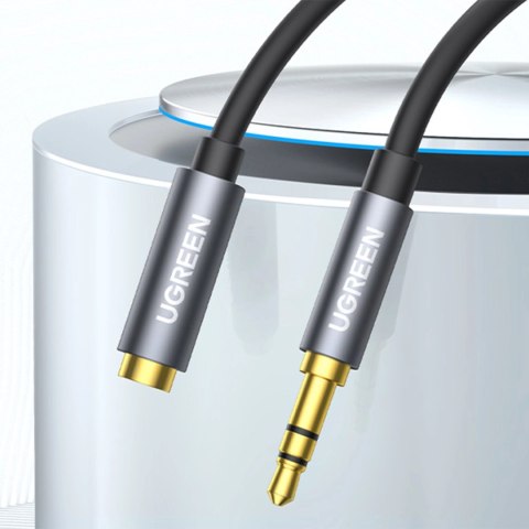 Kabel Ugreen AV118 10592 mini jack 3,5 mm (męski) / mini jack 3,5 mm (żeński) 1m - srebrny Kabel Ugreen AV118 10592 mini jack 3,5 mm (męski) / mini jack 3,5 mm (żeński) 1m - srebrny