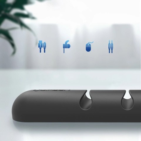 Organizer Ugreen 30762 samoprzylepny na 4 kable - czarny (2 szt.) Organizer Ugreen 30762 samoprzylepny na 4 kable - czarny (2 szt.)