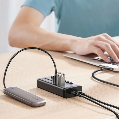Ugreen wielofunkcyjny HUB 7w1 USB Typ C - 7x USB Typ A 3.0 PD DC 12V szary (CM481) Ugreen wielofunkcyjny HUB 7w1 USB Typ C - 7x USB Typ A 3.0 PD DC 12V szary (CM481)
