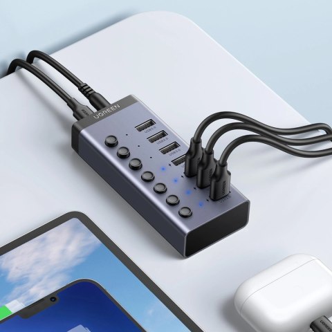 Ugreen wielofunkcyjny HUB 7w1 USB Typ C - 7x USB Typ A 3.0 PD DC 12V szary (CM481) Ugreen wielofunkcyjny HUB 7w1 USB Typ C - 7x USB Typ A 3.0 PD DC 12V szary (CM481)