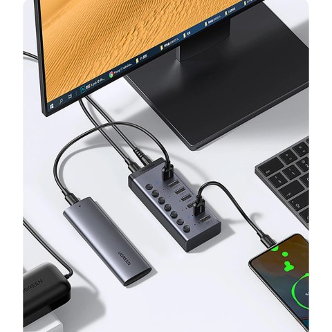 Ugreen wielofunkcyjny HUB 7w1 USB Typ C - 7x USB Typ A 3.0 PD DC 12V szary (CM481) Ugreen wielofunkcyjny HUB 7w1 USB Typ C - 7x USB Typ A 3.0 PD DC 12V szary (CM481)