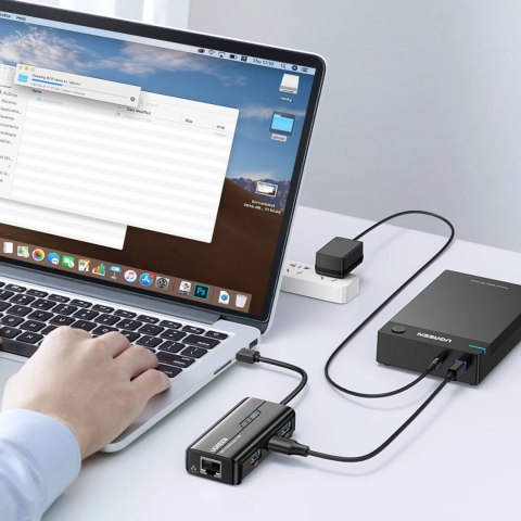 Adapter sieciowy Ugreen 20265 USB-A / RJ45 1000 Mbps HUB 3x USB 3.0 - czarny Adapter sieciowy Ugreen 20265 USB-A / RJ45 1000 Mbps HUB 3x USB 3.0 - czarny