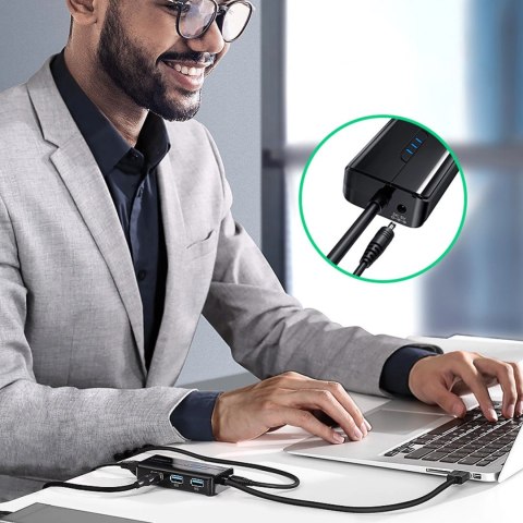 Adapter sieciowy Ugreen 20265 USB-A / RJ45 1000 Mbps HUB 3x USB 3.0 - czarny Adapter sieciowy Ugreen 20265 USB-A / RJ45 1000 Mbps HUB 3x USB 3.0 - czarny